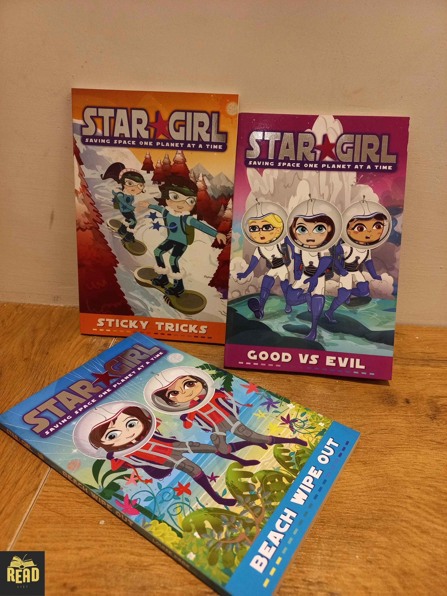 Star Girl Saving Space One Planet at a Time Sticky Tricks Good vs Evil Beach Wipe Out book set