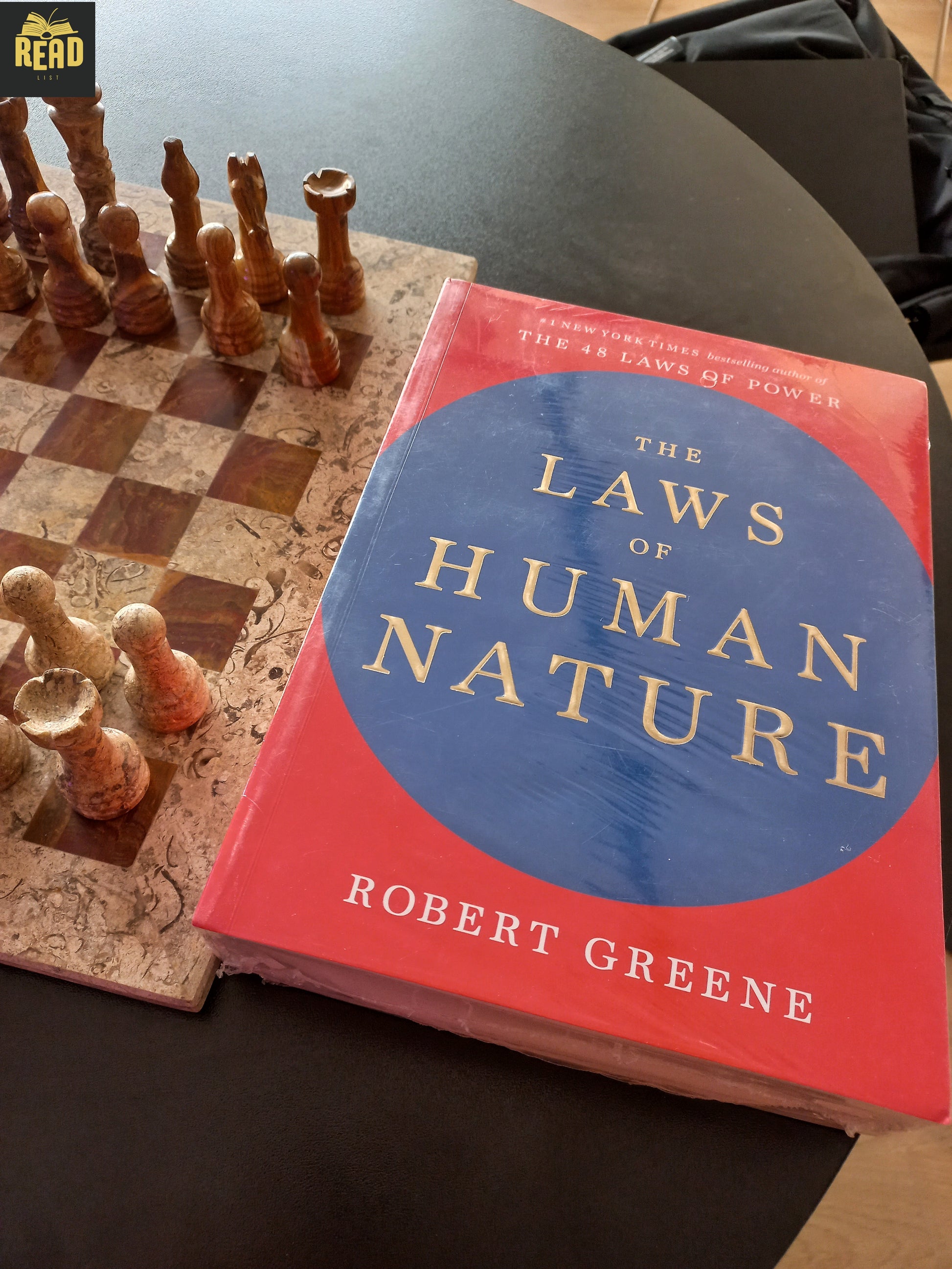 Front cover of The Laws of Human Nature by Robert Greene, a bestselling psychology and self-help book.